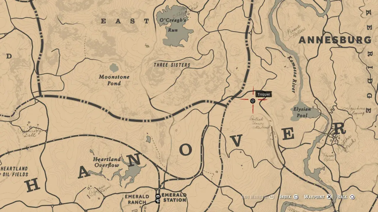 Mapa RDR2 z zaznaczonym traperem na północny zachód od Annesburga, blisko rzeki Kamassa.