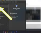 Strzałka wskazuje "Informacje o systemie", gdzie można sprawdzić ustawienia, w tym UEFI Secure Boot.