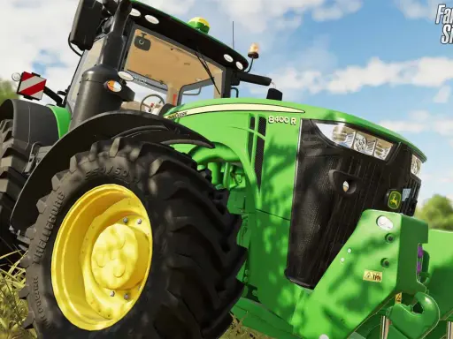 Zielony traktor John Deere 8400 R z gry ls19 na polu.