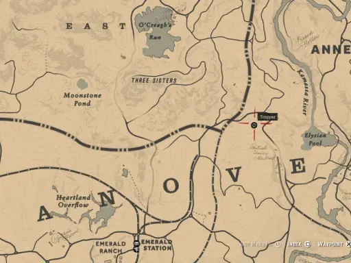 Mapa RDR2 z zaznaczonym traperem na północny zachód od Annesburga, blisko rzeki Kamassa.