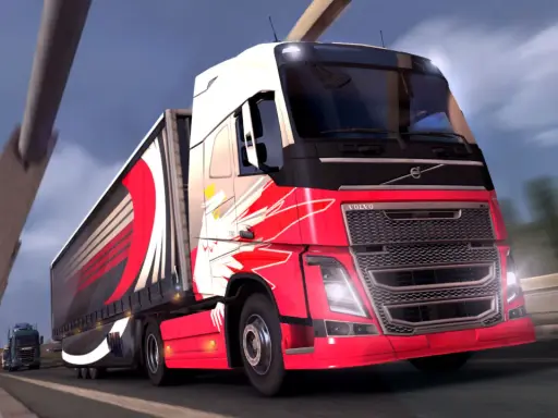 Czerwone ciężarówki ets2 z efektownymi grafikami pędzą po autostradzie.