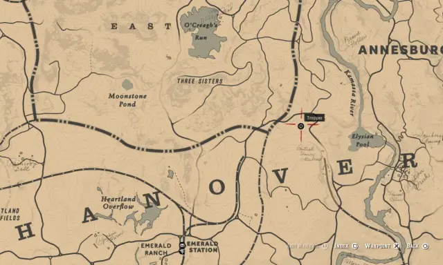 Mapa RDR2 z zaznaczonym traperem na północny zachód od Annesburga, blisko rzeki Kamassa.