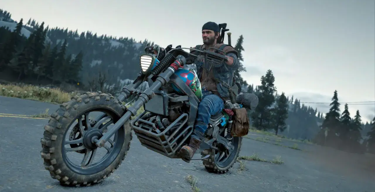 Deacon jedzie motocyklem przez las, zastanawiając się, czy będzie Days Gone 2.