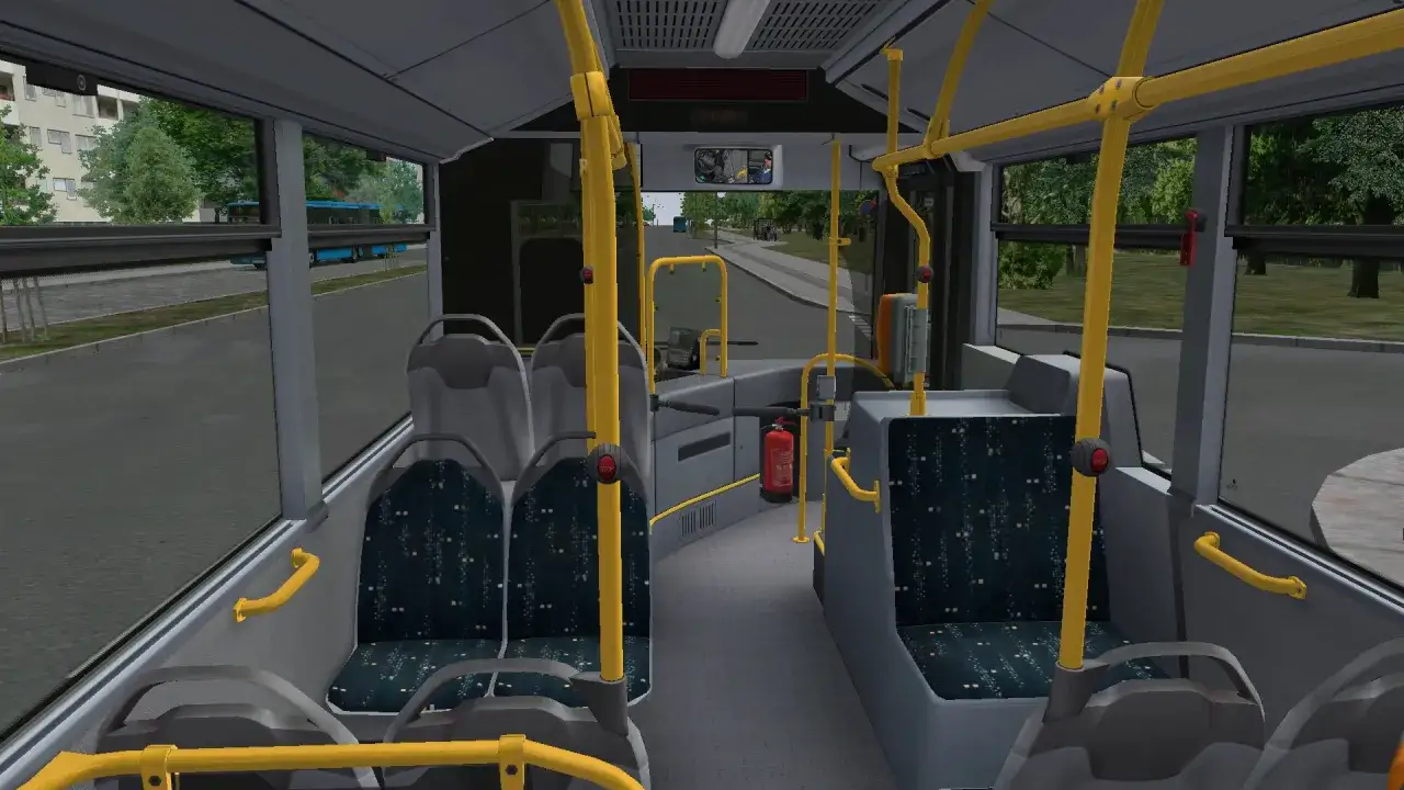 Wnętrze autobusu z gry OMSI 3. Widoczne siedzenia, poręcze i gaśnica.