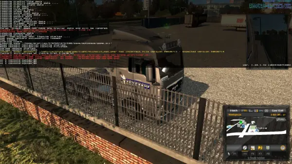 Komendy ETS2: błąd ładowania pliku trailera, brakujące dane, ale gra działa. Widok na ciężarówkę MAN i mapę z Krakowem.