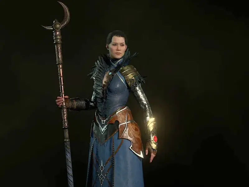 Czarodziejka z Diablo 4 w niebieskiej szacie i z kosturem, gotowa do walki. Idealny diablo 4 czarodziej build.